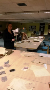 Archivist Chloe Phillips shows volunteers letters written back from the Front a century ago