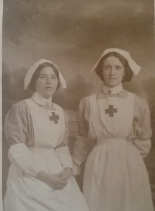 Lillie Uren (left) in nurse's uniform